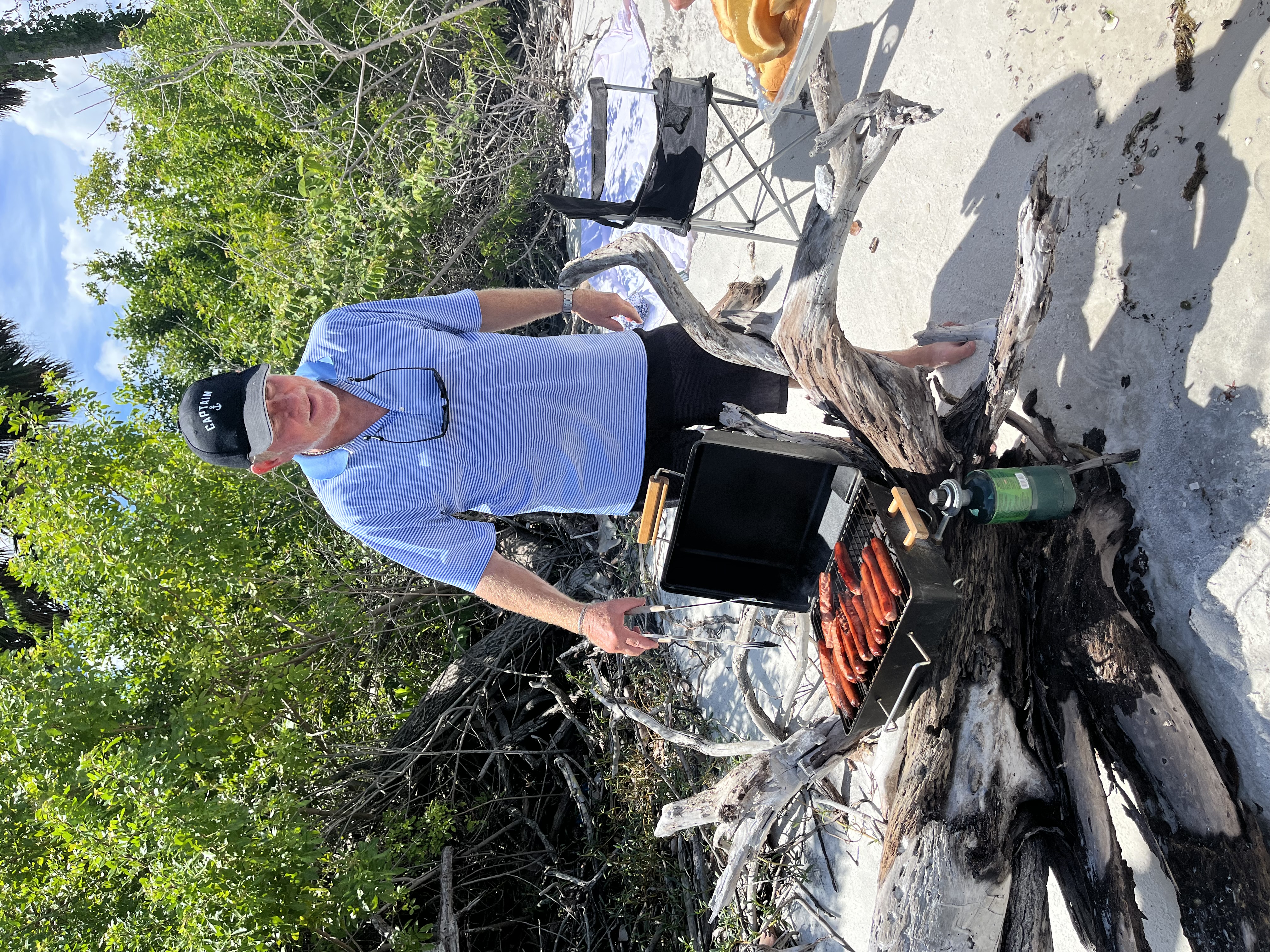 Captain cooking on grill