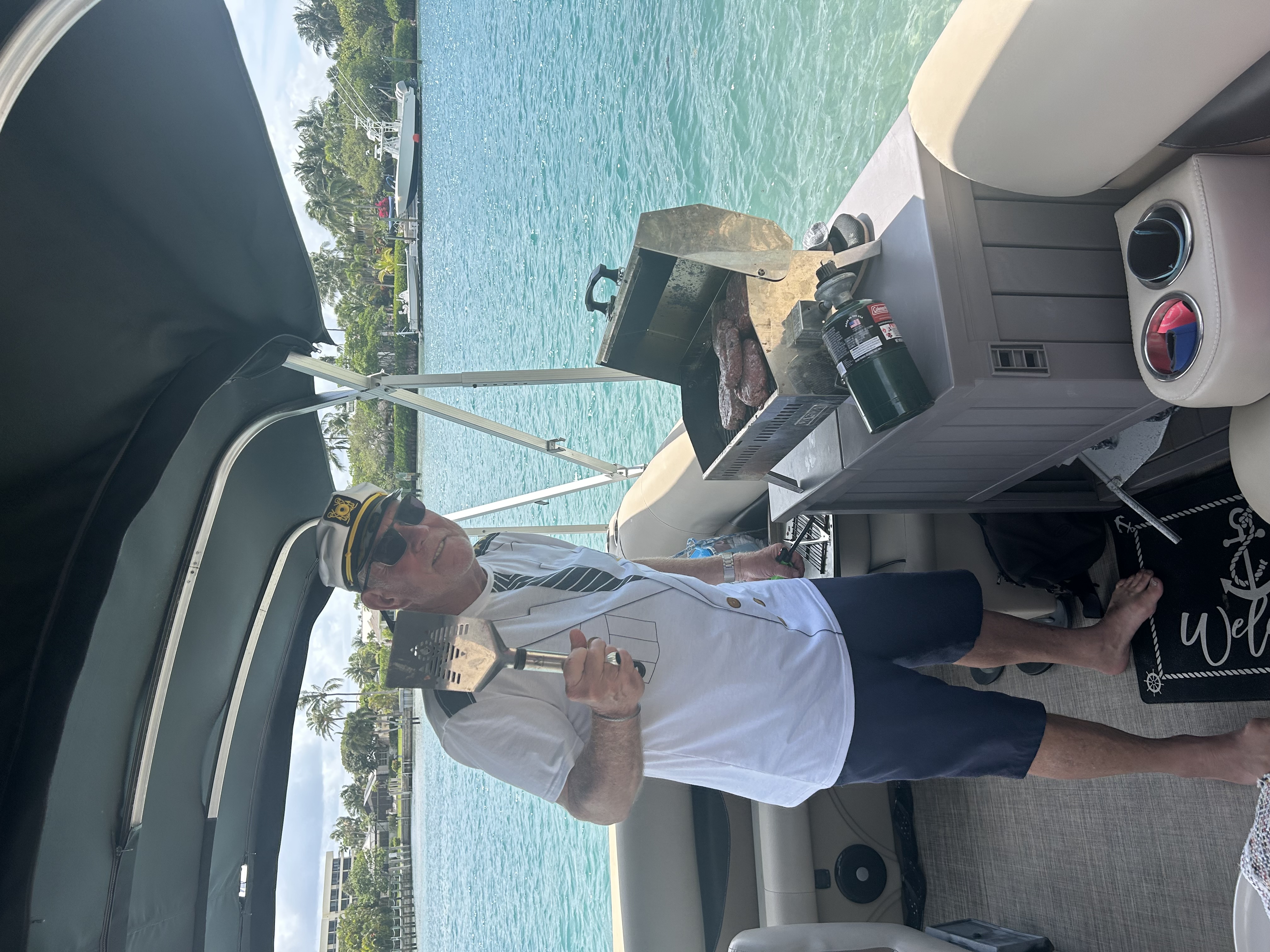 Captain Ross grilling on the boat